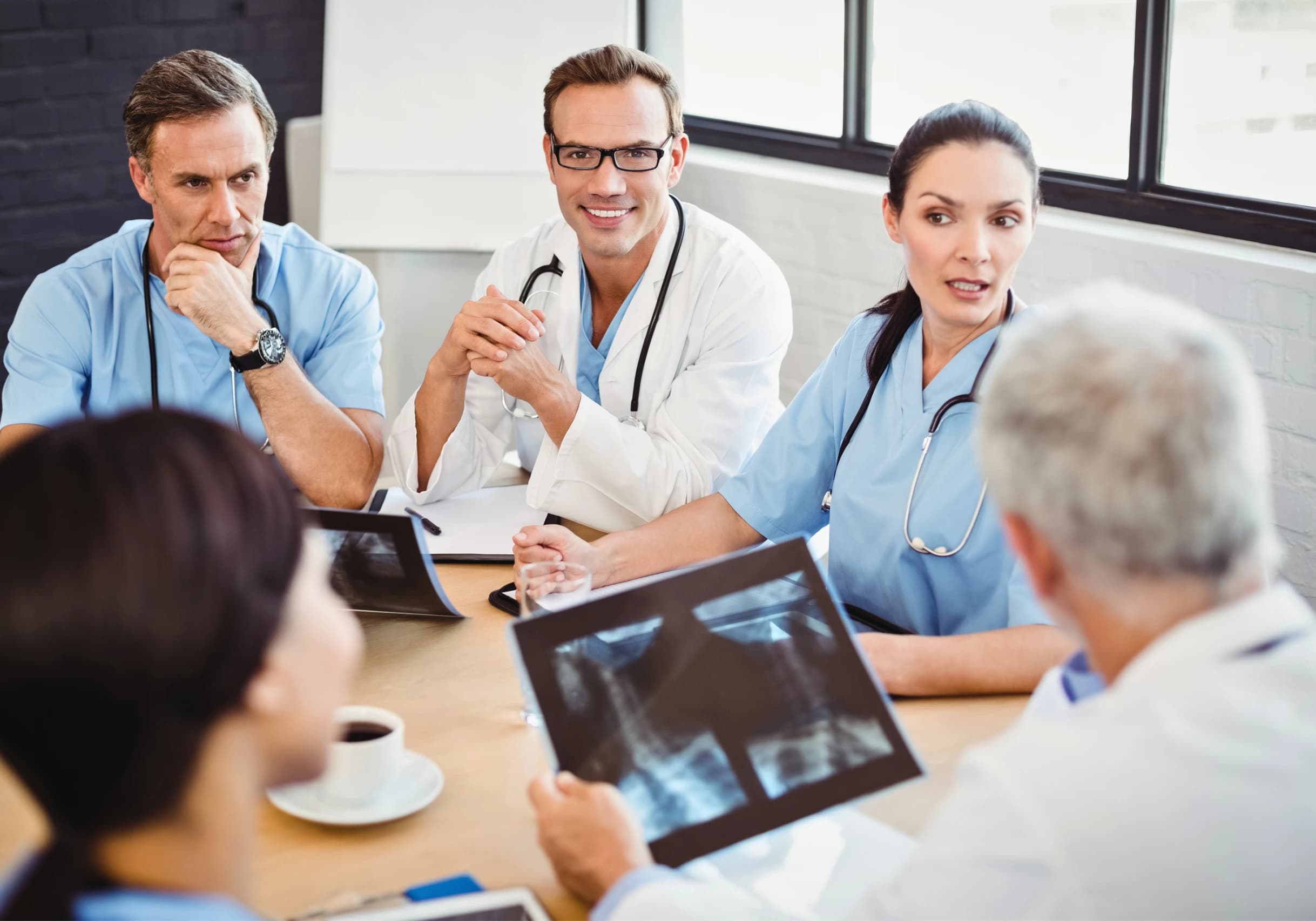 Healthcare leadership in a discovery and consultation meeting