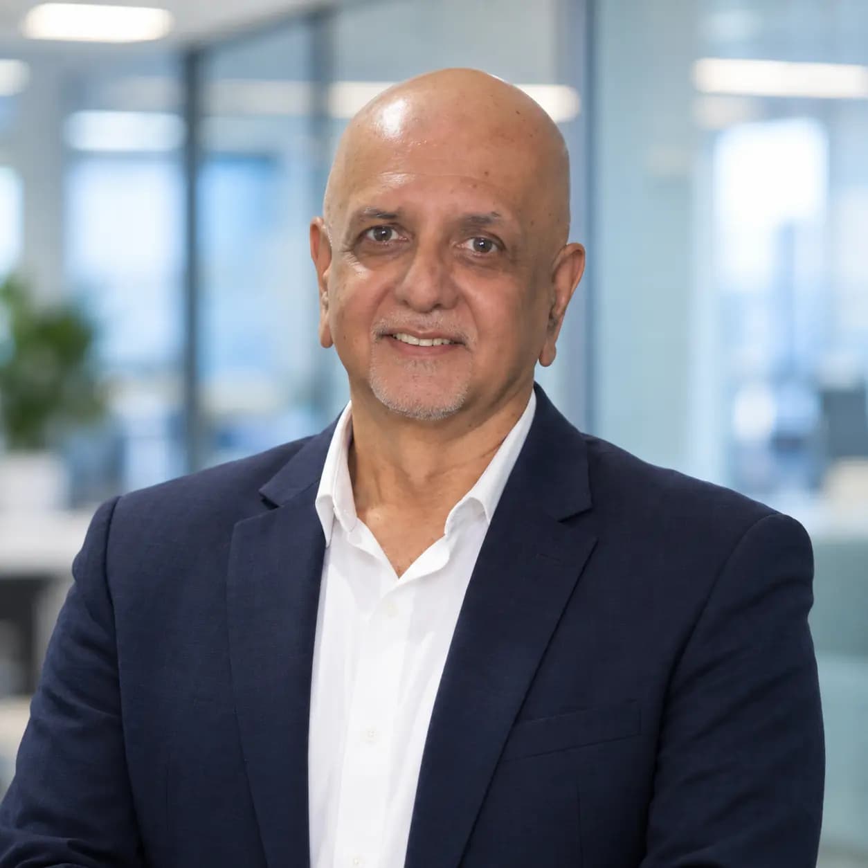 Portrait of Rajendra Kango, Executive Director and CEO
